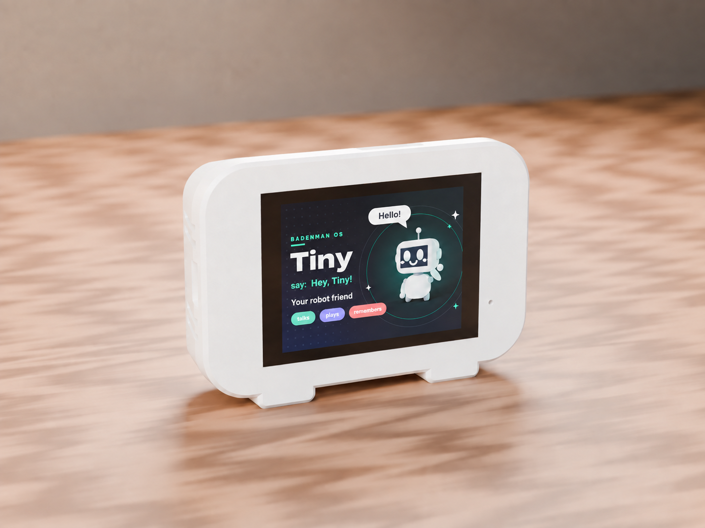 White Tiny desktop robot on a wooden table